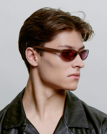 Cat-eye A.Kjærbede solbriller med lilla glas - fra siden herre