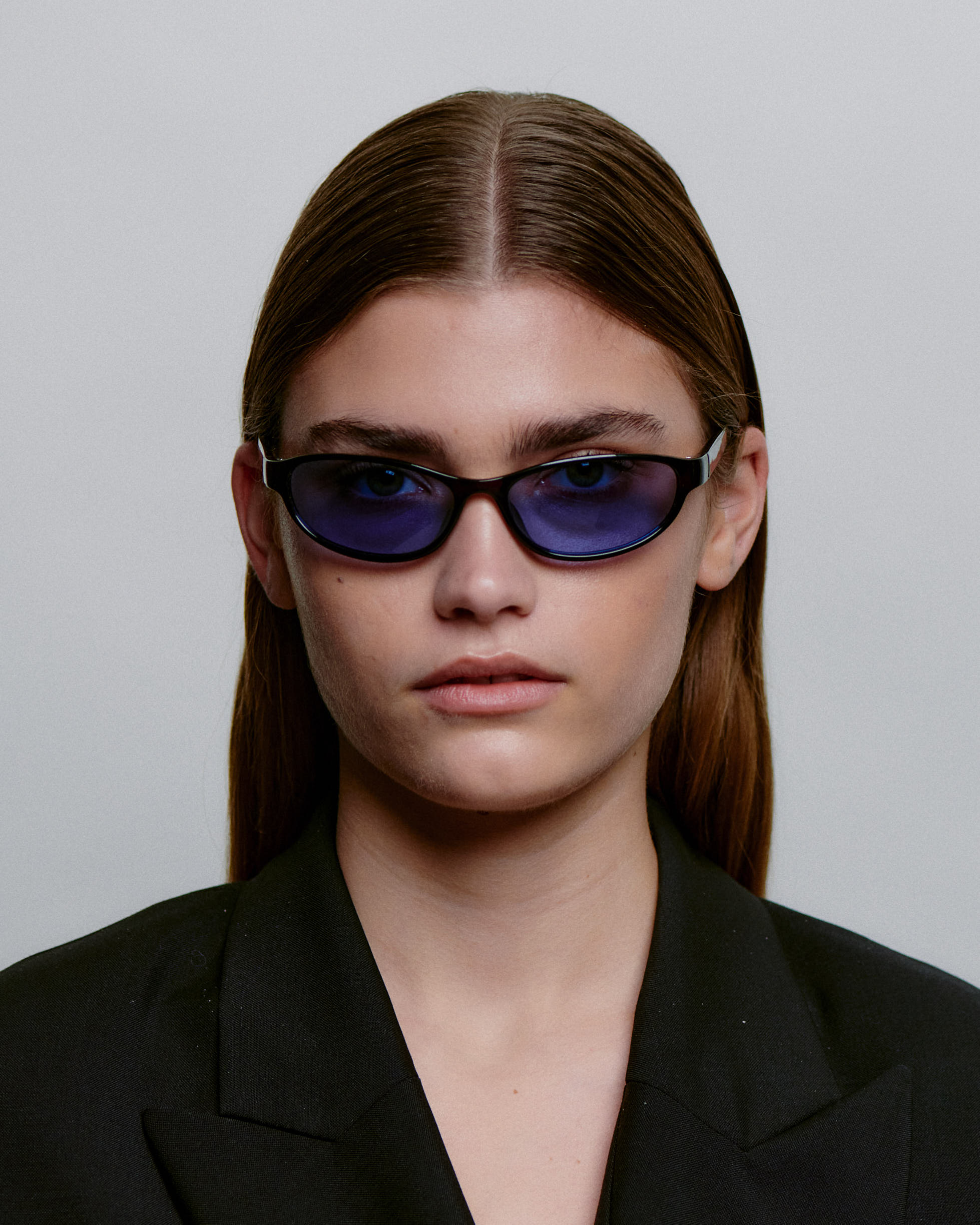 Cat-eye A.Kjærbede solbriller med blå glas - foran på dame