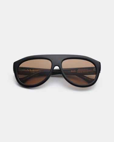 Store sorte aviator A.Kjærbede solbriller med brun glas - liggende